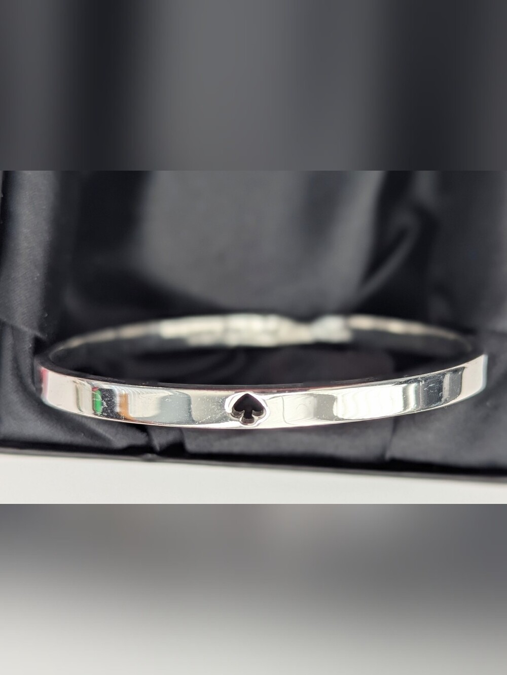 Kate Spade Silver-Tone Bangle Bracelet with Ace of Spade Cutout